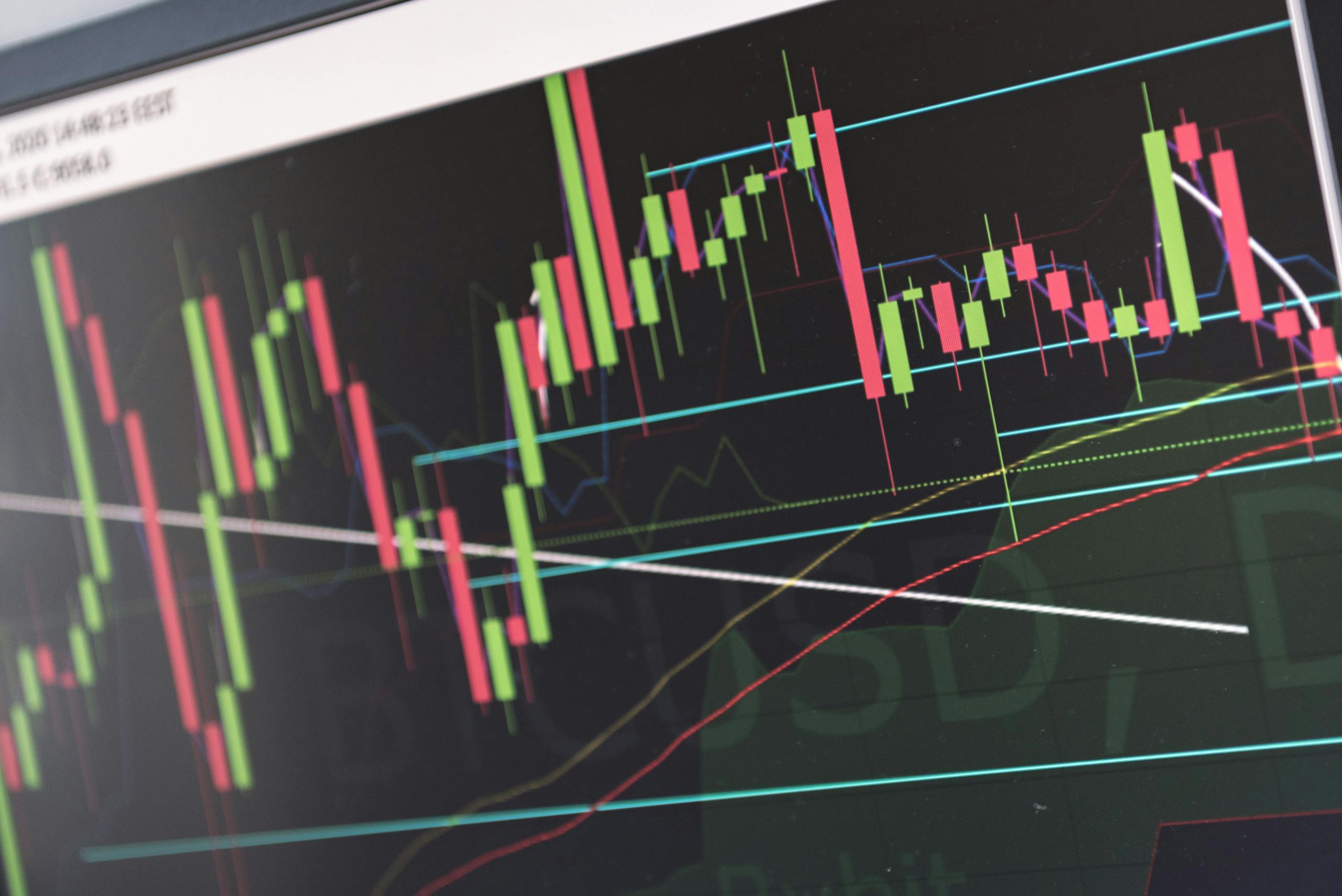 Nueraji vs Crosbie Prediction Close-up of vibrant stock market graphs displaying trading trends on a monitor, ideal for finance and cryptocurrency concepts.