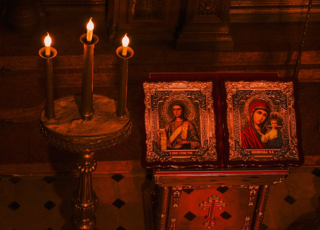 Phil or Lil of Rugrats Crossword A serene interior view of an Istanbul church showcasing candle-lit religious icons and ornate details.