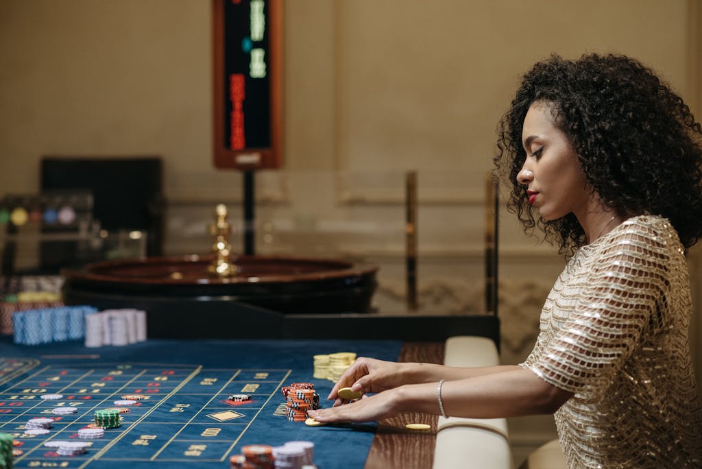 Norsk Casino Stylish woman in a casino setting, playing roulette with stacks of chips.